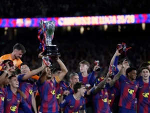 Barca claim La Liga title with Clasico win