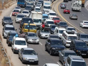 Hundreds of thousands of Lebanese head home as fighting eases, many still stranded