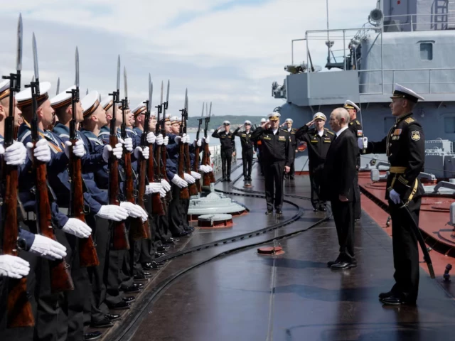 Russia’s Putin visits Japan-claimed islands for first time, Tokyo protests