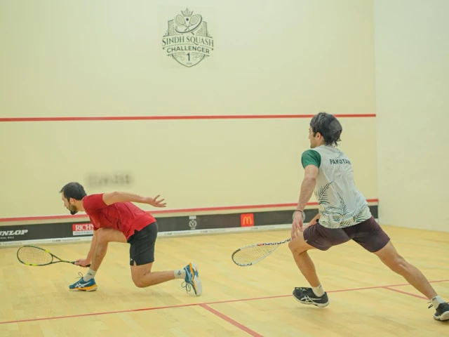 Nasir fights back to win squash title